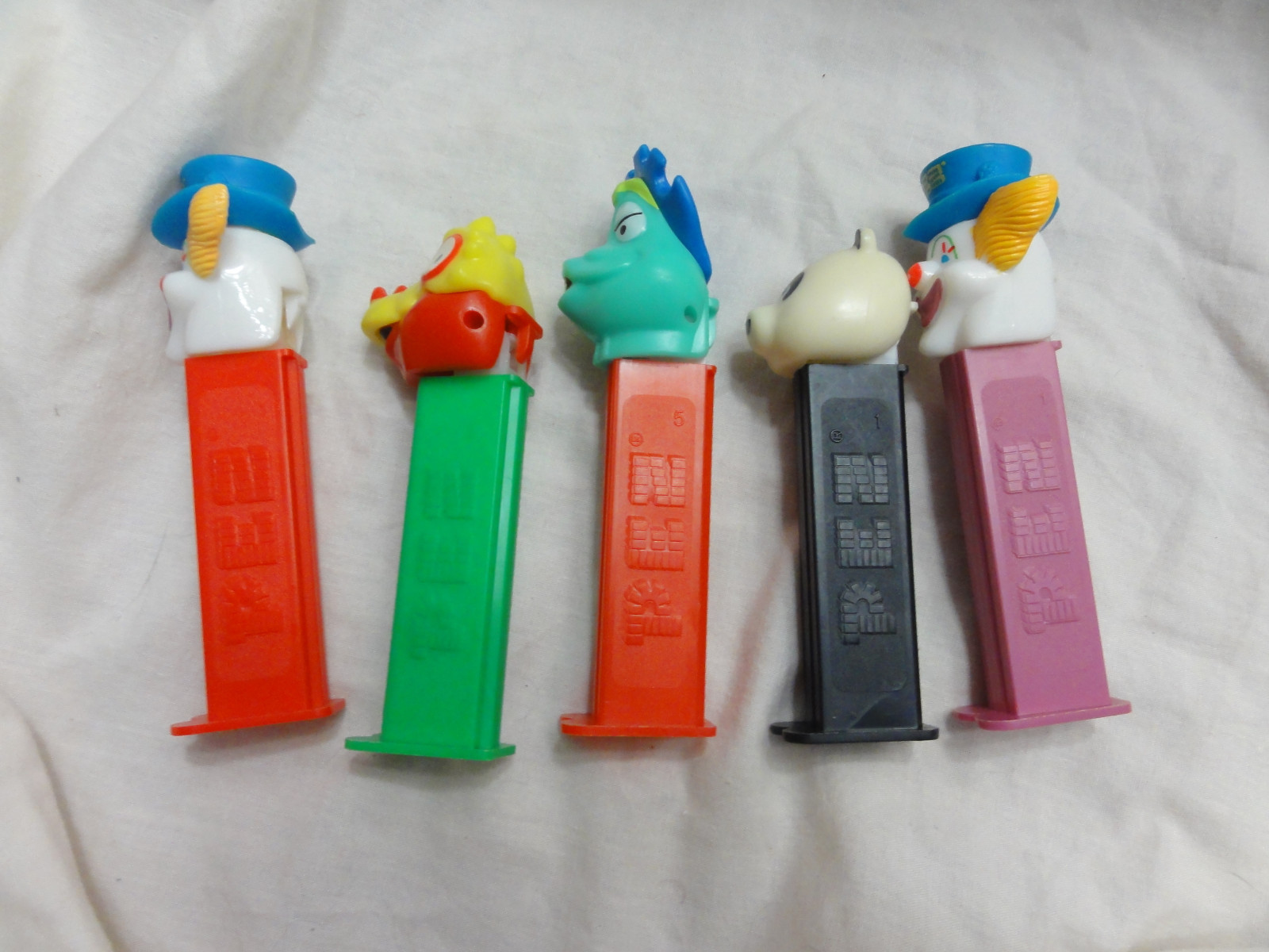 Pez Lot 5 Panda, SHE-SAUR, I-Saur, Peter PEZ Clown Issue B Purple/Red Stem
