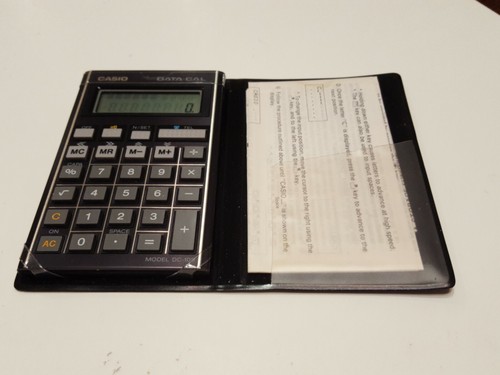 Vintage Casio Data Cal DC-100 Pocket Calculator in Case w/ Instructions Japan