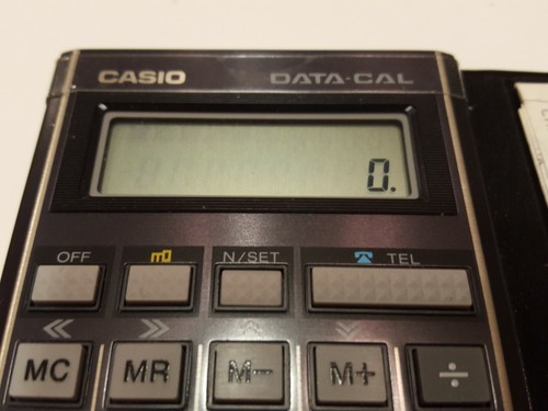 Vintage Casio Data Cal DC-100 Pocket Calculator in Case w/ Instructions Japan