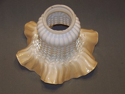 Iridescent ruffled lip glass replacement shade ceiling fan fixture.