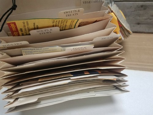 Recipe Box with Handwritten and clipped recipes  estate find.