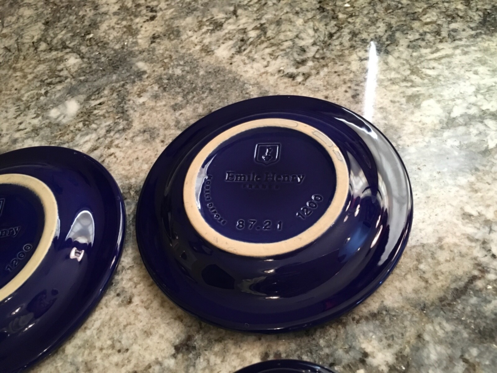 2 Emile Henry Cups and Saucers Blue