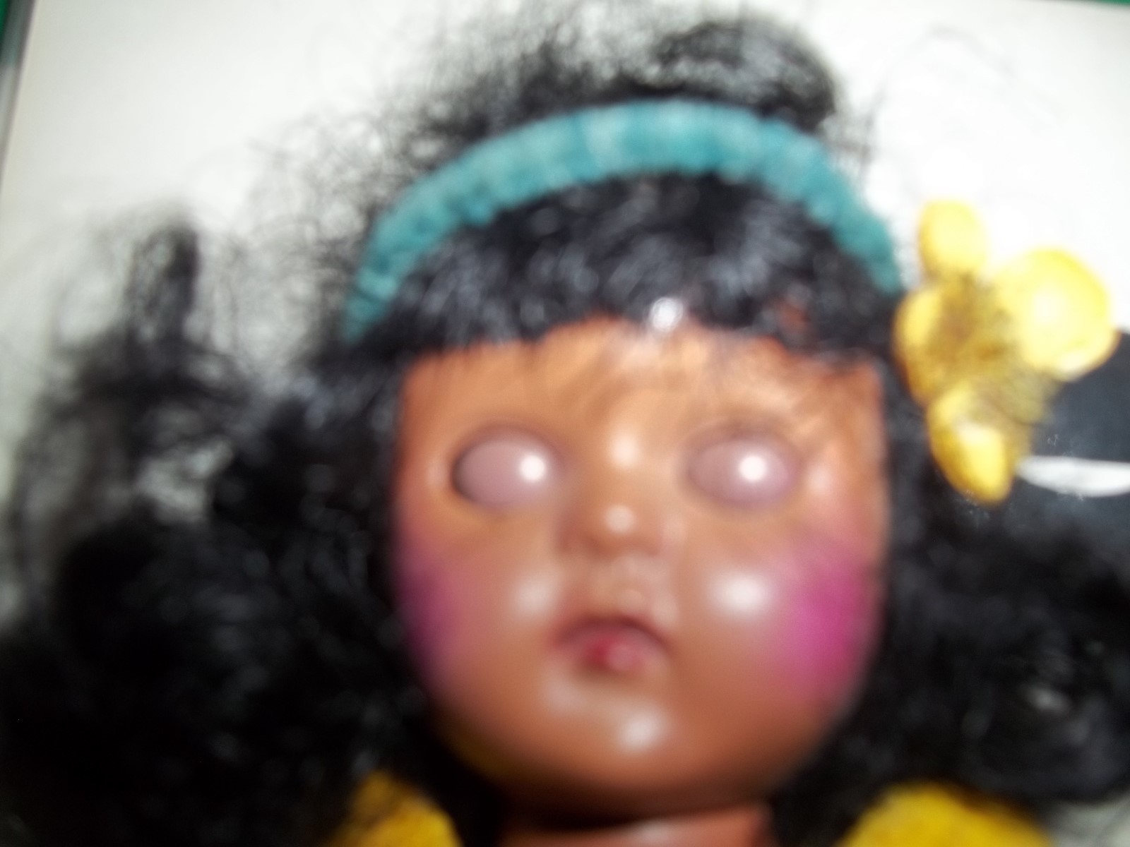 Hawaiian hula girl with grass skirt