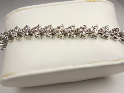 DAZZLING DIAMOND TENNIS BRACELET 5.0 CARAT TOTAL    14KT WHITE GOLD