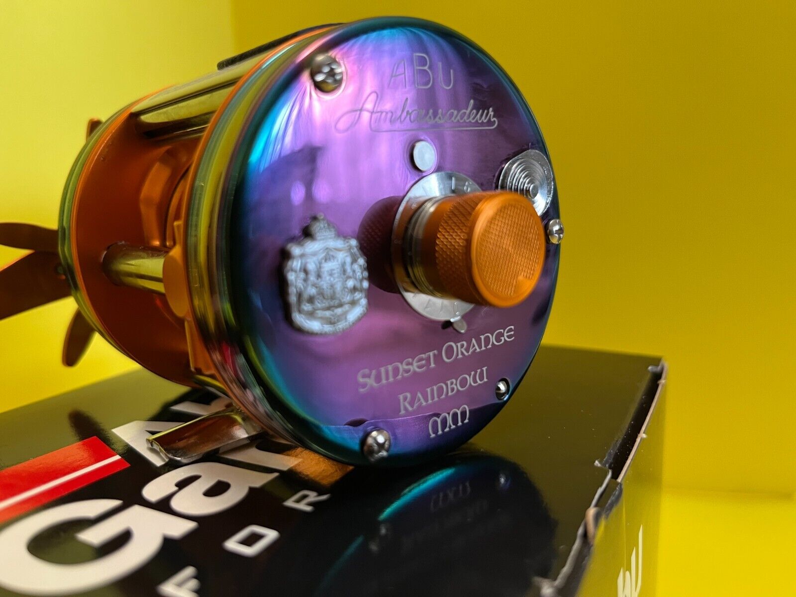 Abu Garcia AMBASSADEUR 6500 CS Rainbow Sunset Orange MM PRO Abu Garcia AMBASSADEUR 6500 CS Rainbow Sunset Orange MM PRO