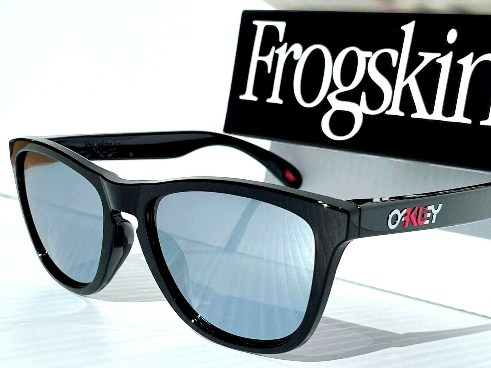 NEW Oakley Frogskins Black polished POLARIZED Galaxy Chrome NEW Oakley Frogskins Black polished POLARIZED Galaxy Chrome