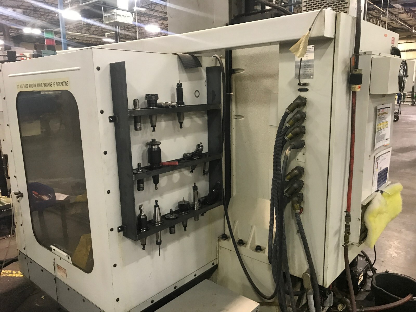 HAAS VF-0 CNC VMC With Tool Changer 4th Axis Chip Auger and CAT 40 Tooling  1995