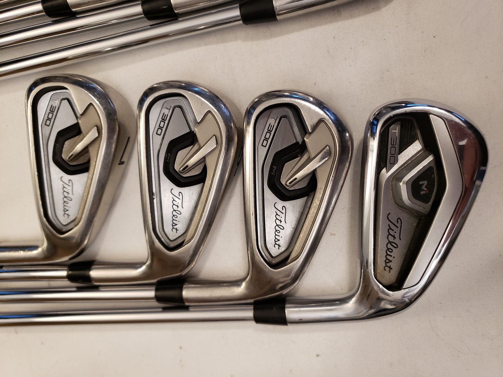 Used Titleist T300 Iron Set (4-PW, GW) 8 Irons - Stock AMT Red R300 - Reg - RH