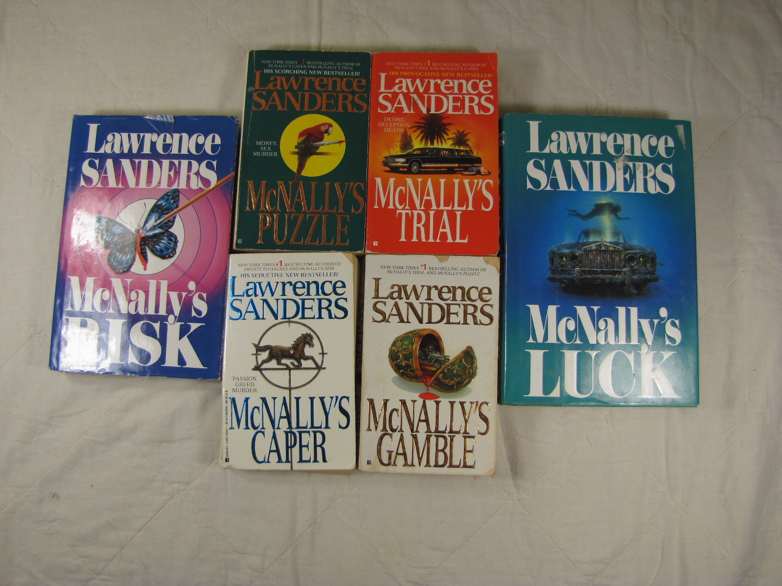 6 Lawrence Sanders McNally novels: Caper; Gamble; Luck; Puzzle; Risk; Trial