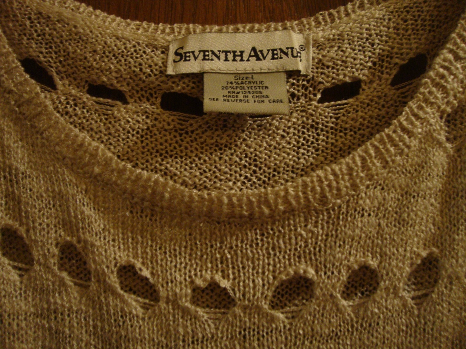 lot of 3 Size L ladie's clothing items: Multi-color top, beige sweater, camisole