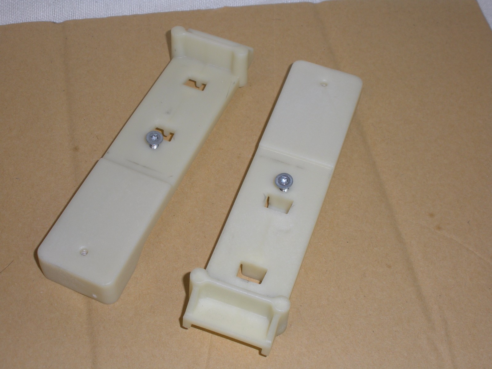 DRAWER SLIDE BRACKET SET OF 2 PULLED FROM A BRAND NEW KUDD03STPA10 DISHWASHER