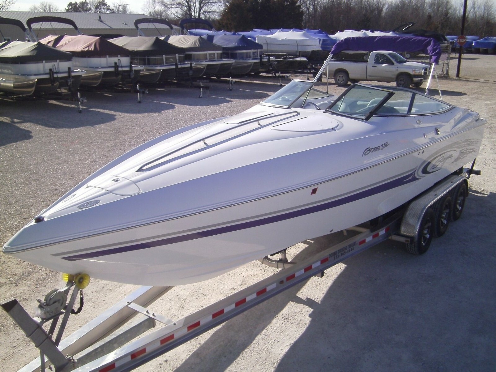 2002 30' Baja Boss 302, Twin fuel injected 496's, & triple axle aluminum trailer
