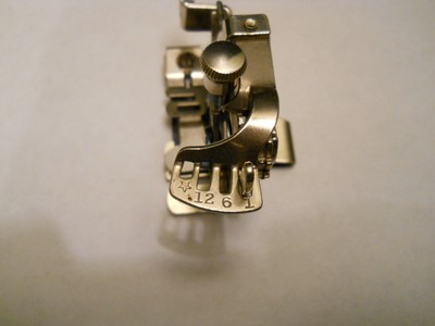 Singer sewing machine replacement part #1261 - adjustable ruffler (pre-owned)