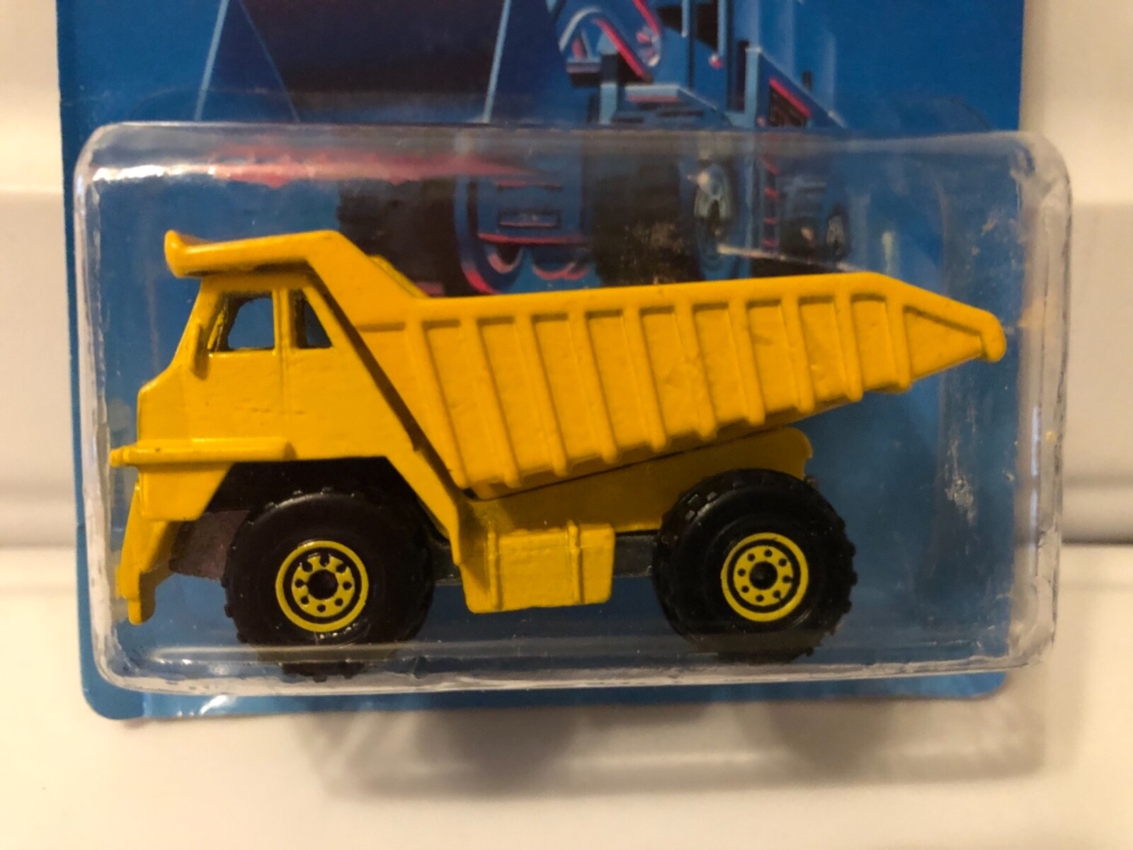 Vintage hot wheels cat dump truck on Un punched  card