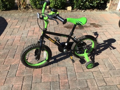 Raleigh Striker Cycle with 14”wheels and fitted with stabilisers