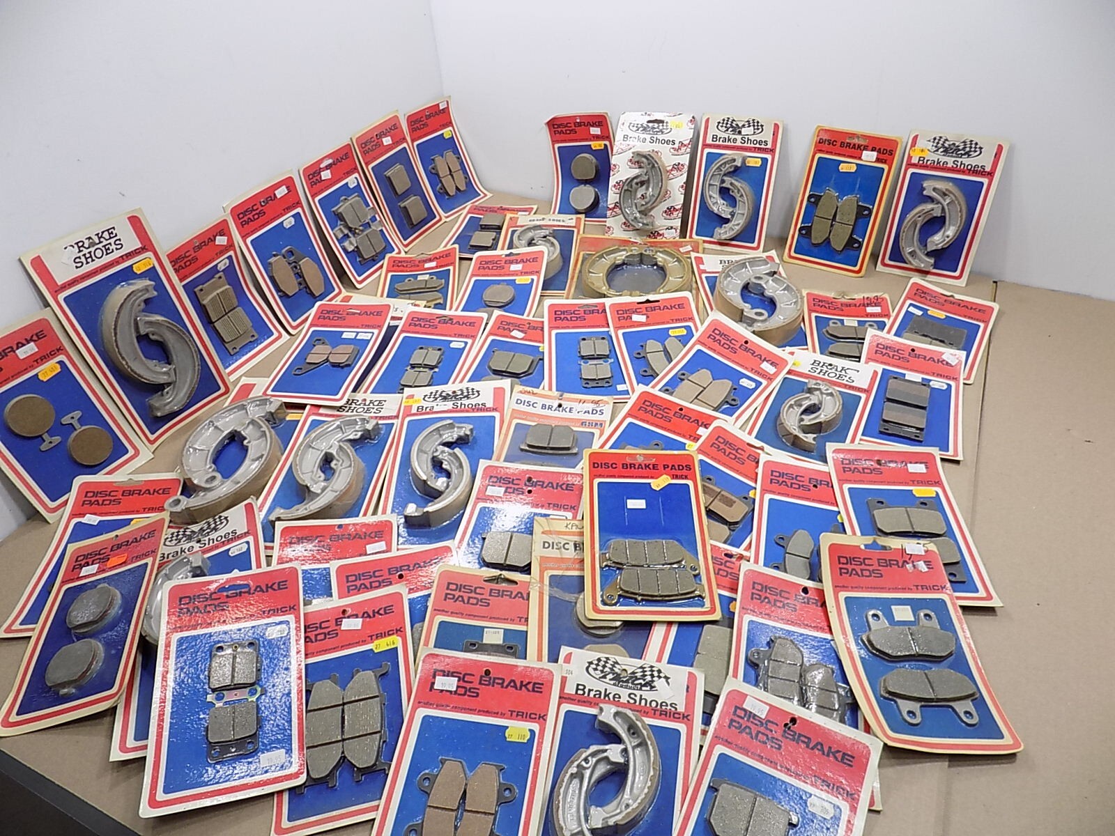 NEW NOS WHOLESALE LOT OF TRICK MOTORCYCLE BRAKE PADS AND SHOES / 54 PIECES / #2