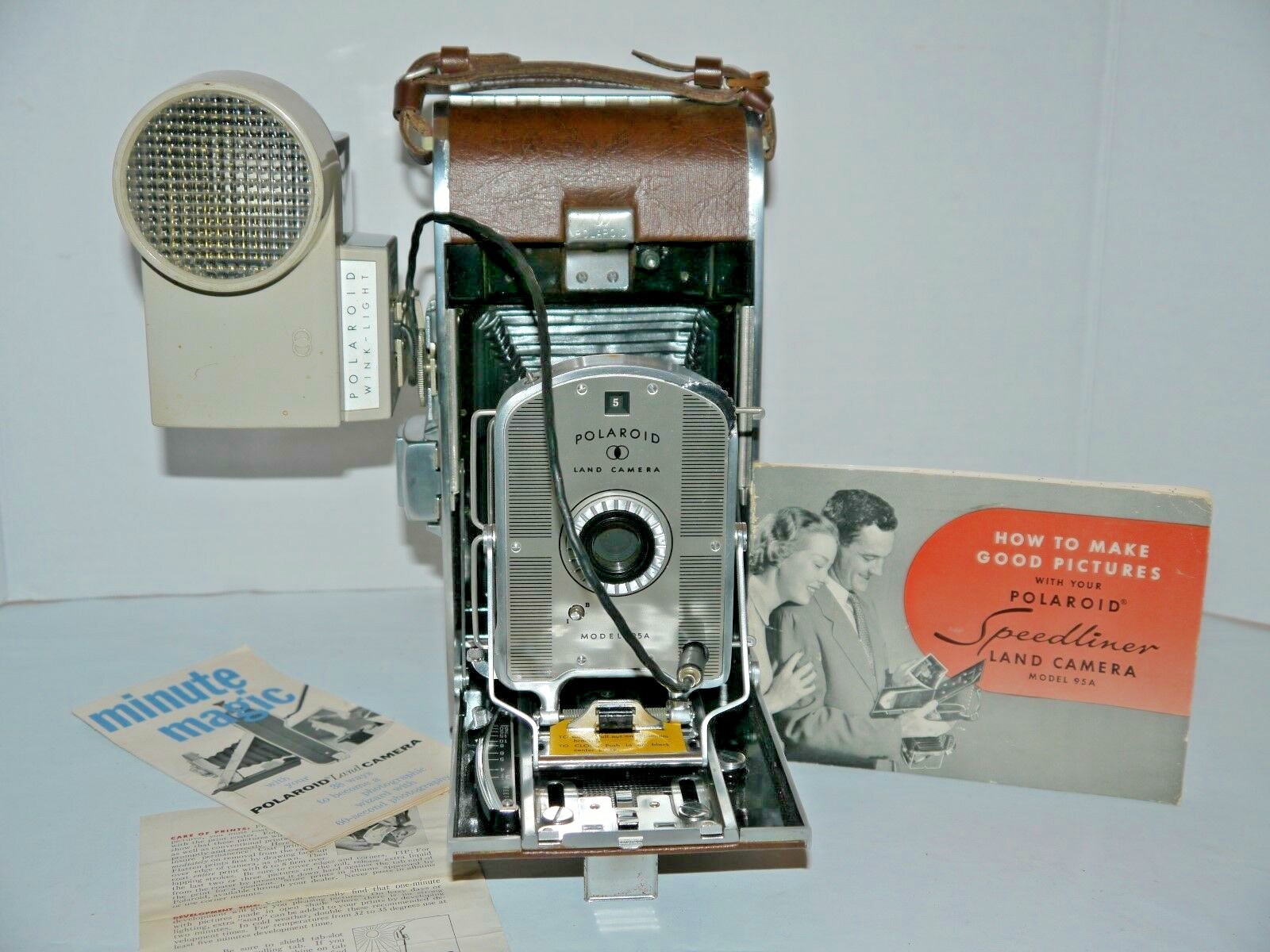 Polaroid speedliner land camera #95a w/polaroid wink-light-camera manuals
