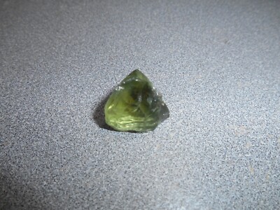 Tourmaline faceting rough. 21.8 cts. green color. Pre-form - clean. Congo.