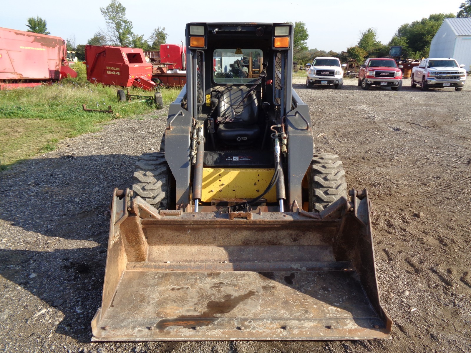 2003 New Holland LS180 Skid Loader, High Flow, Sticks/Pedals, 4n1 bucket, 809hrs