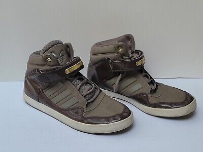 Black and gold cheap high top adidas
