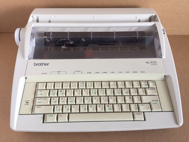 Brother typewriter photos of Brother ML 100 by year then serial number
