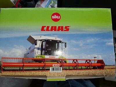 Siku Combine Claas Lexion 600 Cat 4253 1:32 Scale Mint in poor box Discontinued