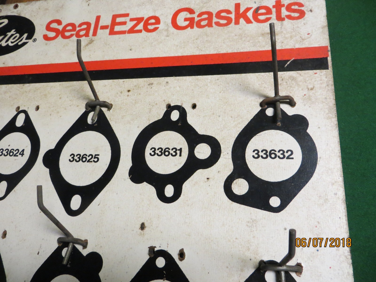 Gates seal eze gaskets auto display rack fiber board wall hanger auto shop sign