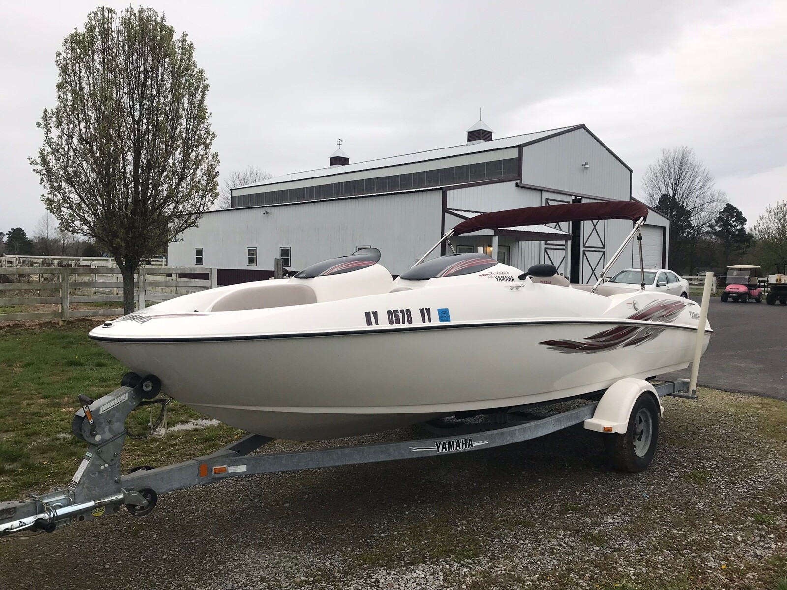 2001 Yamaha ls2000 Jet Boat, 20 feet long, white and burgundy with bimini