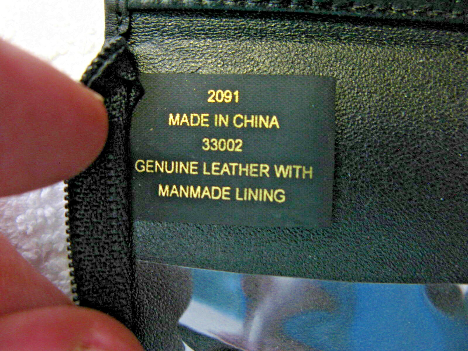 Aigner black leather travel sewing kit