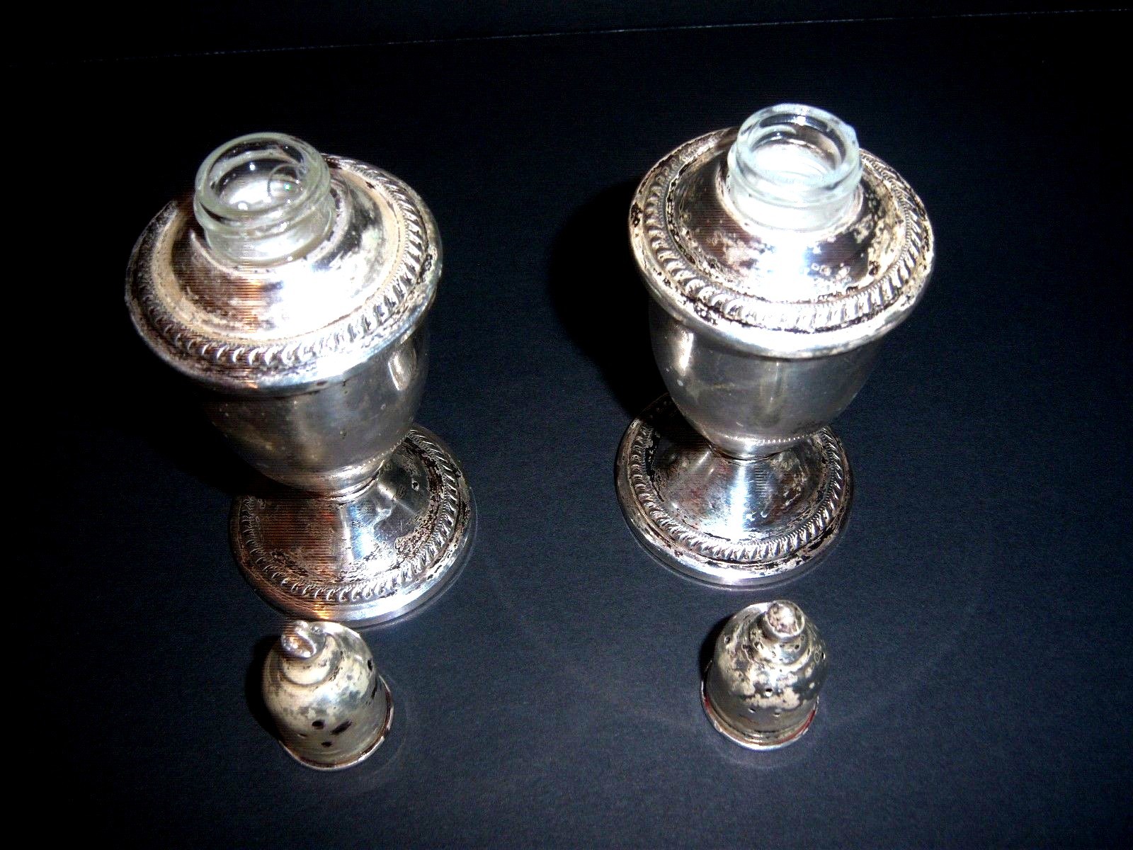.ELEGANT DUCHIN STERLING SILVER AND PEPPER GLASS LINED SHAKERS
