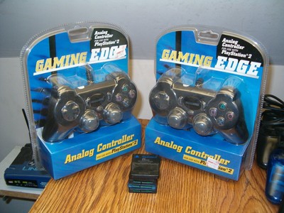 PS2 LOT 2 SLIM CONSOLES,4 CONTROLLERS,2 PWER AC ADAPTERS,2 AV CABLES,40 GAMES ++