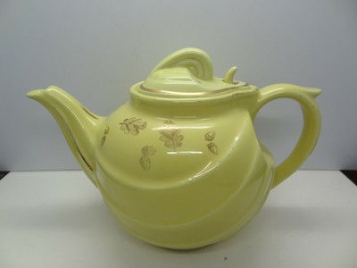 rope and fern teapot and beautiful. Yellow and Green