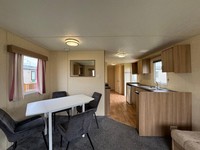 Cheap sited static caravan for sale North Wales - family run park low site fees