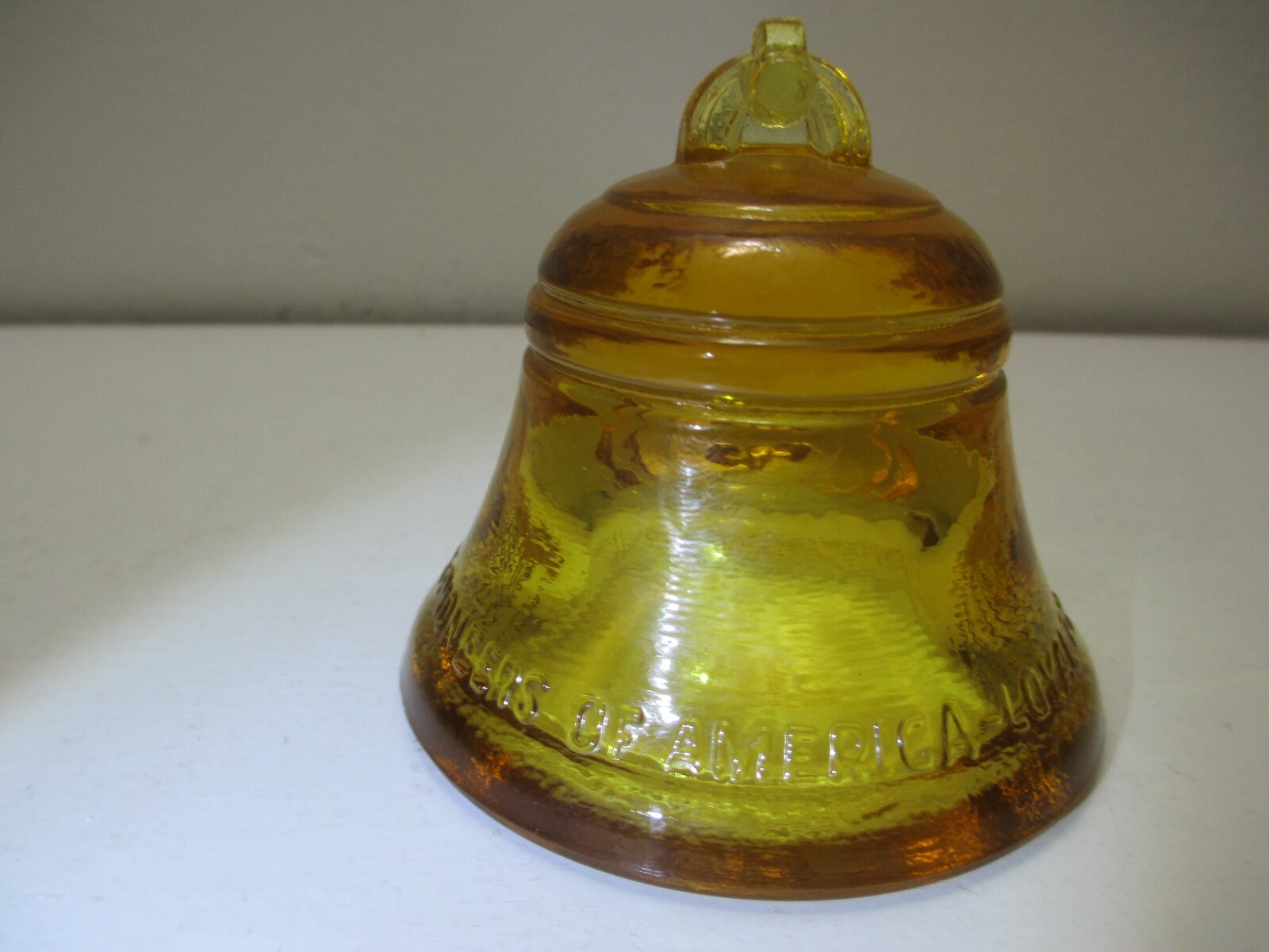 Vintage Telephone Pioneers of America Glass Bell Paperweight Amber 1985