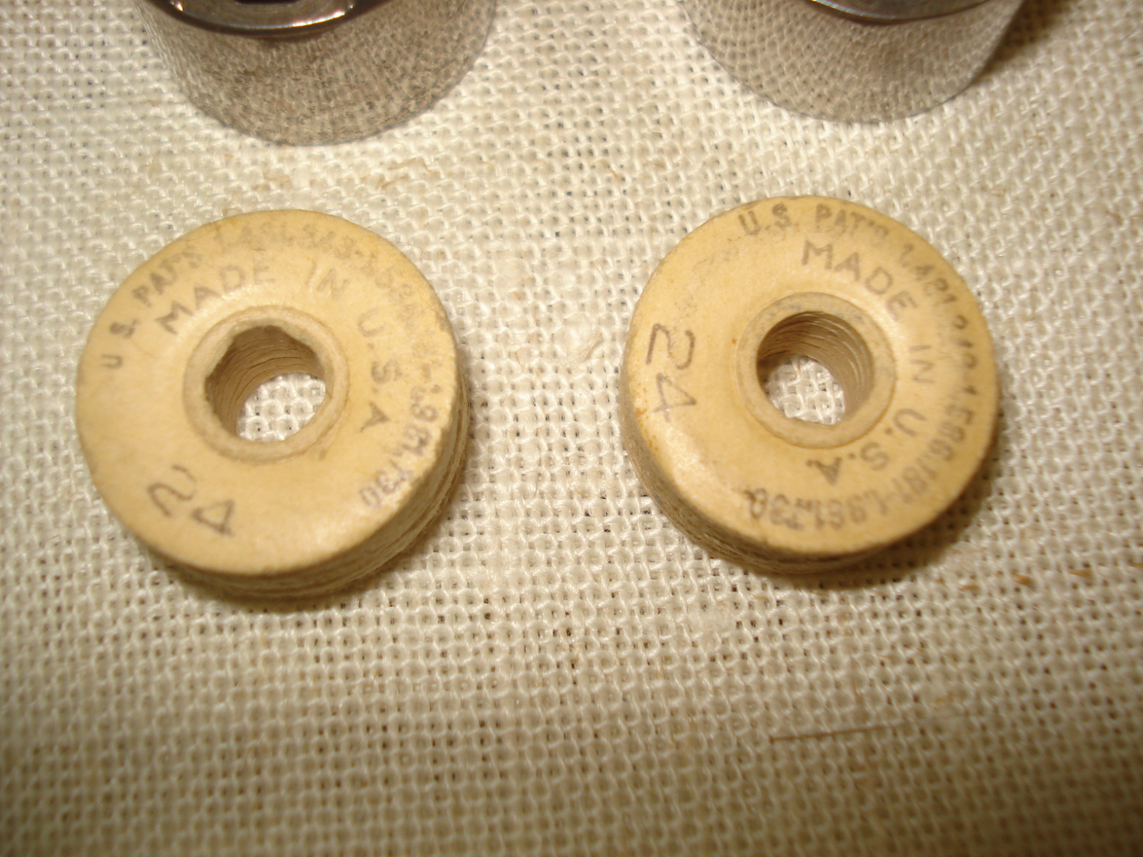 Lot 2 Antique Sewing Machine Bobbin Cases & 2 Threads