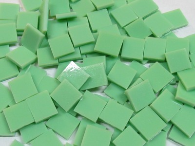 green pastel hand cut mosaic glass tile . 100  total pieces