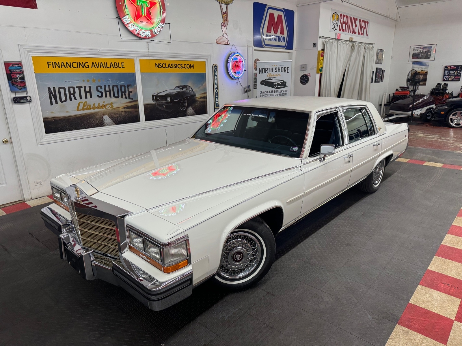 White Cadillac Brougham with 45,638 Miles available now!