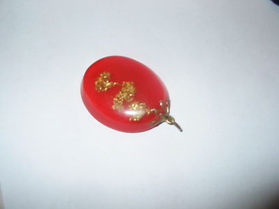 Vintage Pendant GOLD FLAKE in LUCITE RESIN red approx 1 1/2''