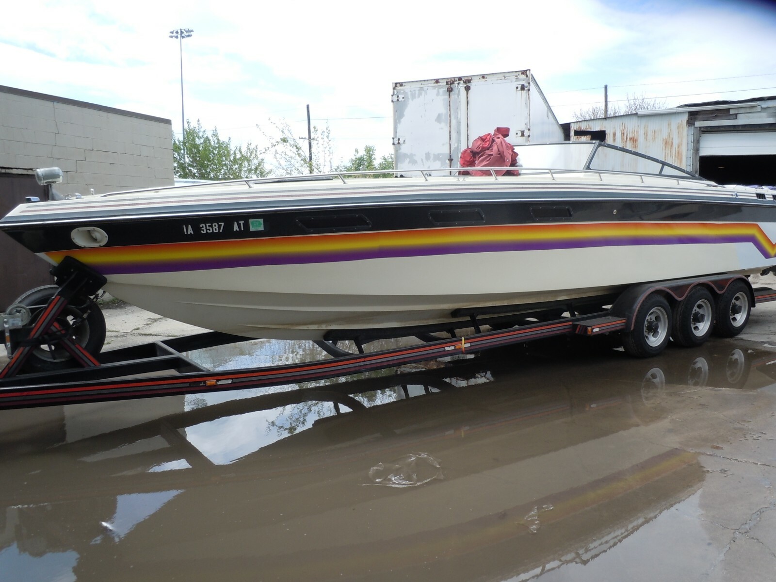 1984 32' BAHA GO FAST BOAT WITH TWIN 454'S AND A 3-AXLE TRAILER