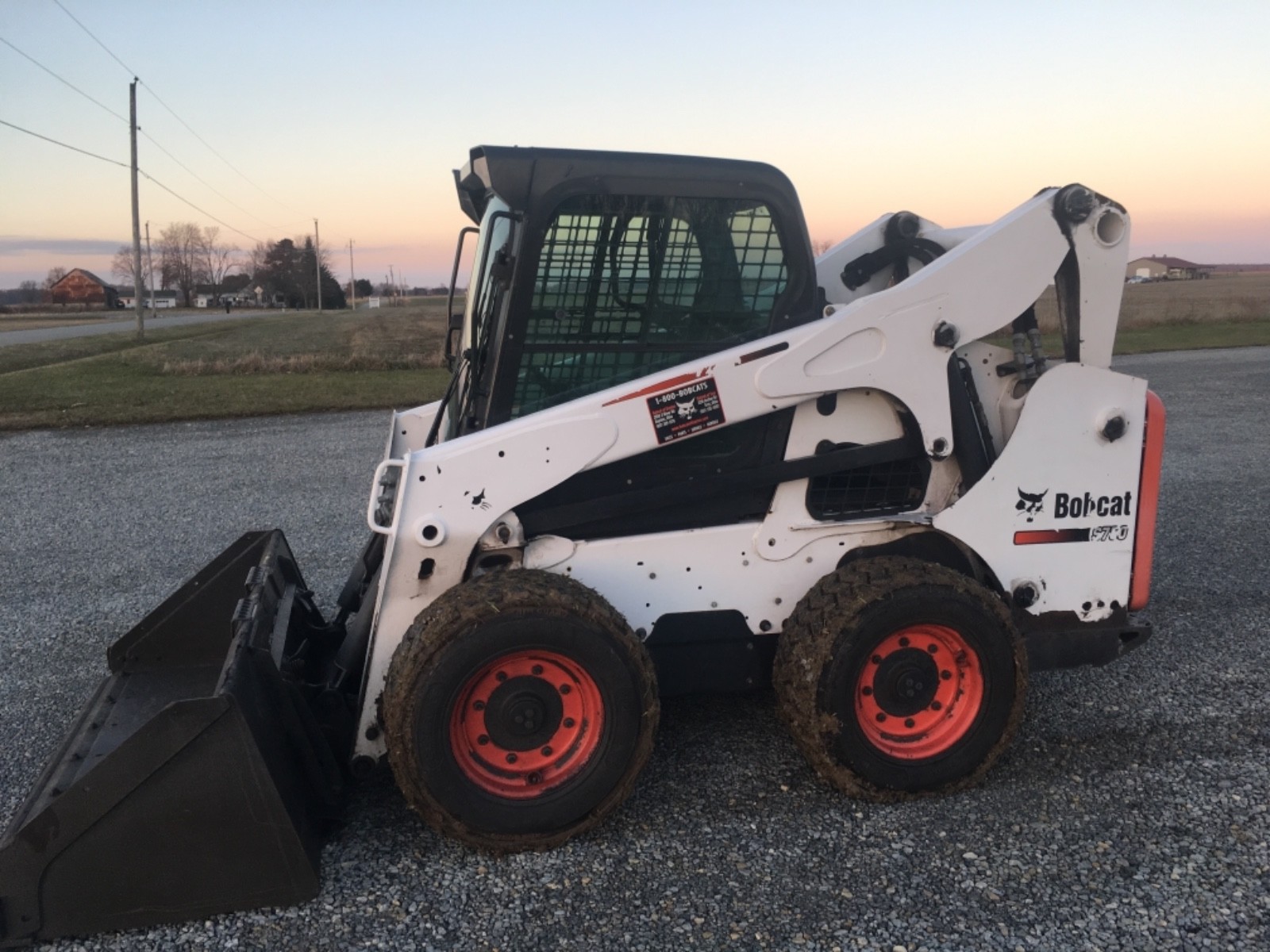2013 BOBCAT S750 SKID STEER,  CAB- HEAT AND AIR, SPEED CONTROL, PILOT CONTROLS