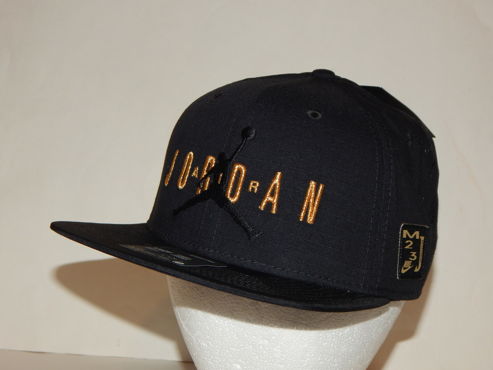 jordan cap black gold