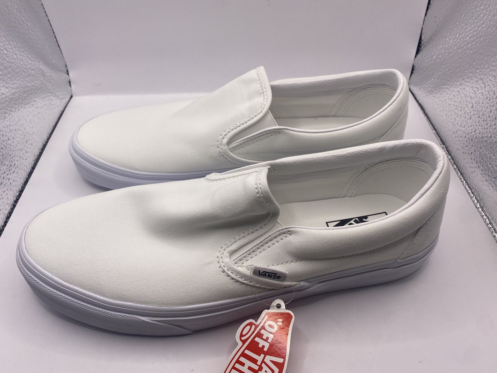 white can slip ons