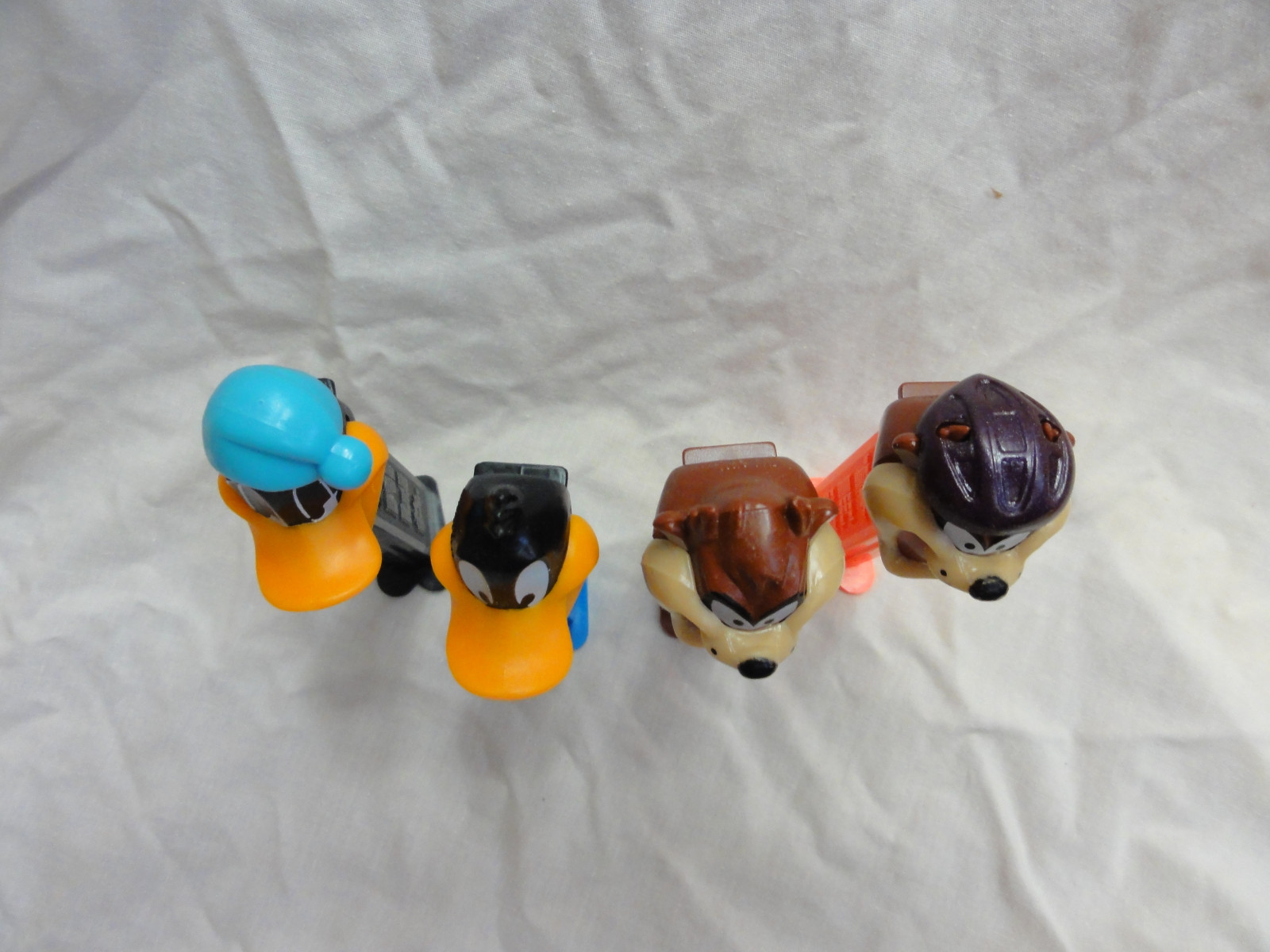 Pez Lot 4 LOONEY TUNES Daffy Duck Issue B/Sleepy ~ Tasmanian Devil A/Cycling Taz