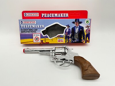 Lone Star - Peacemaker 12 Shot Ring Cap Repeater Pistole. NEU in OVP
