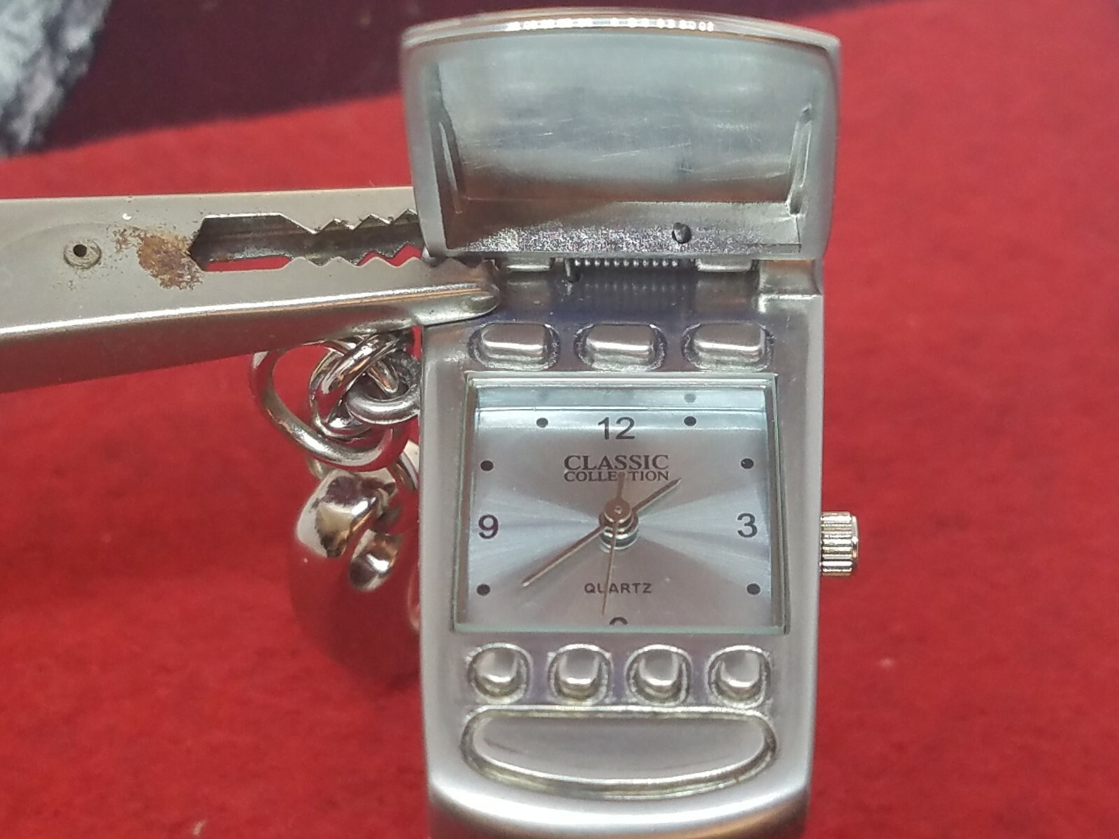 VINTAGE CELL FLIP PHONE WATCH SILVER MOTOROLA DESIGN WORKING ORDER NEW BATTERY