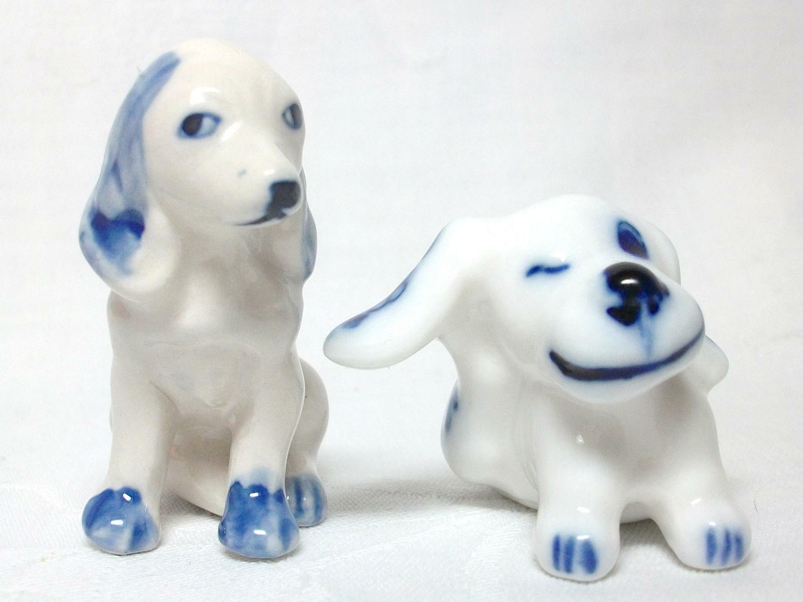 Two Porcelain Delft Blue & White Miniature Dogs Figurines