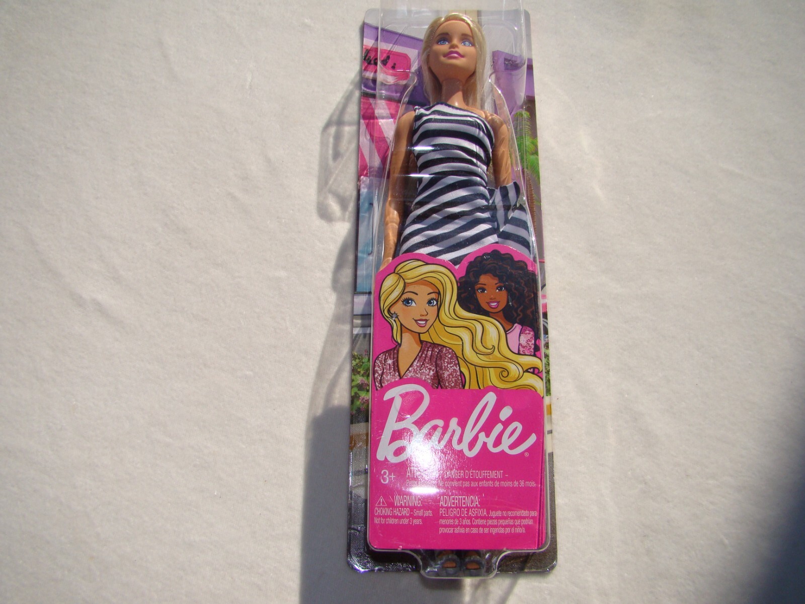Barbie Glitz Doll in Black & White Striped Ruffled One Arm