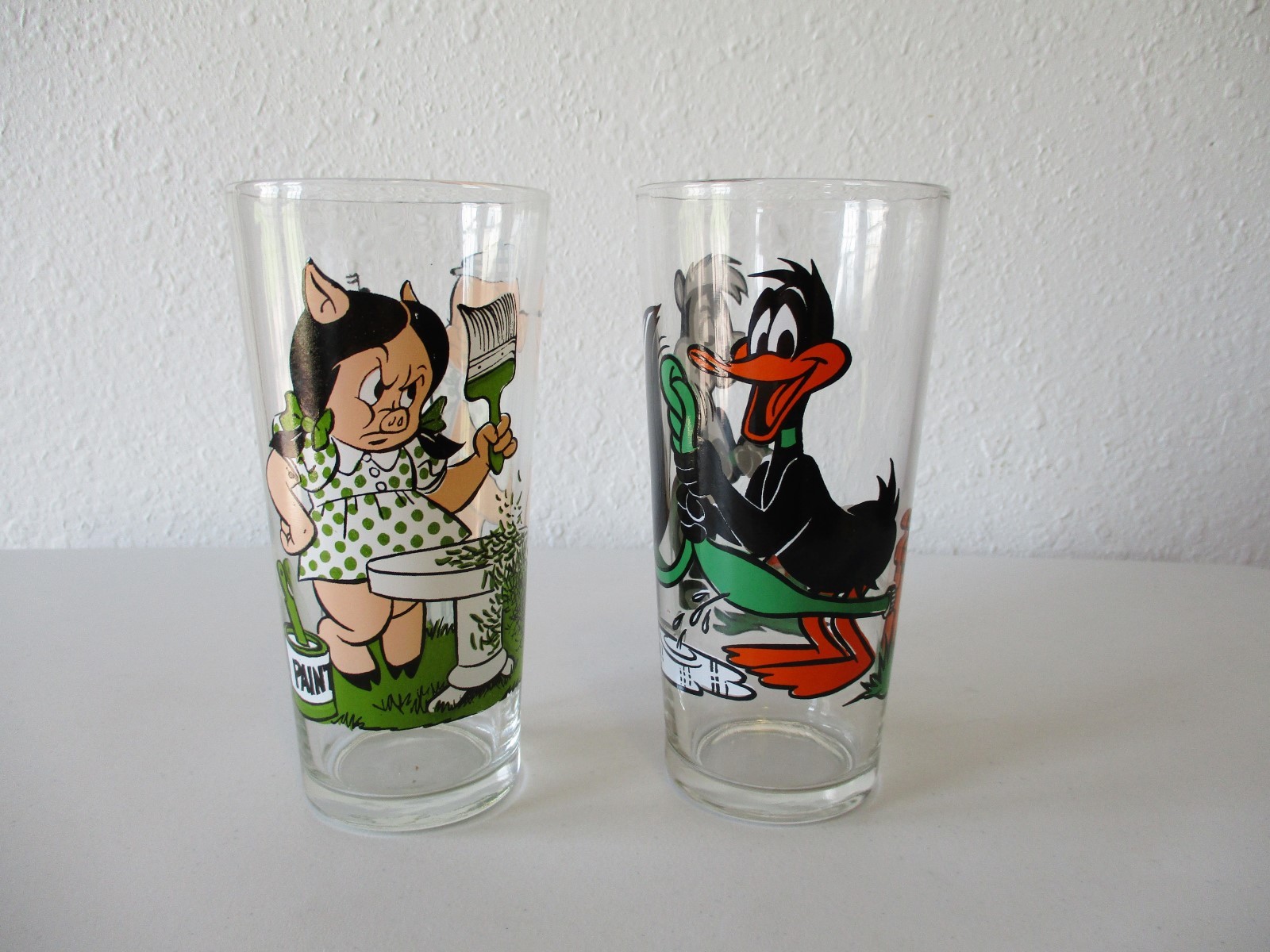 2-1976 Pepsi Warner Bros Glasses-Porky Pig w/Petunia & Pepe w/Daffy Duck Thick