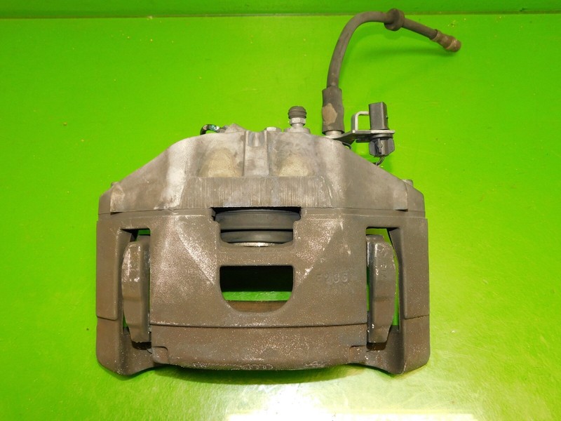 05-09 Audi A4 OEM passenger right front brake caliper slide COMPLETE
