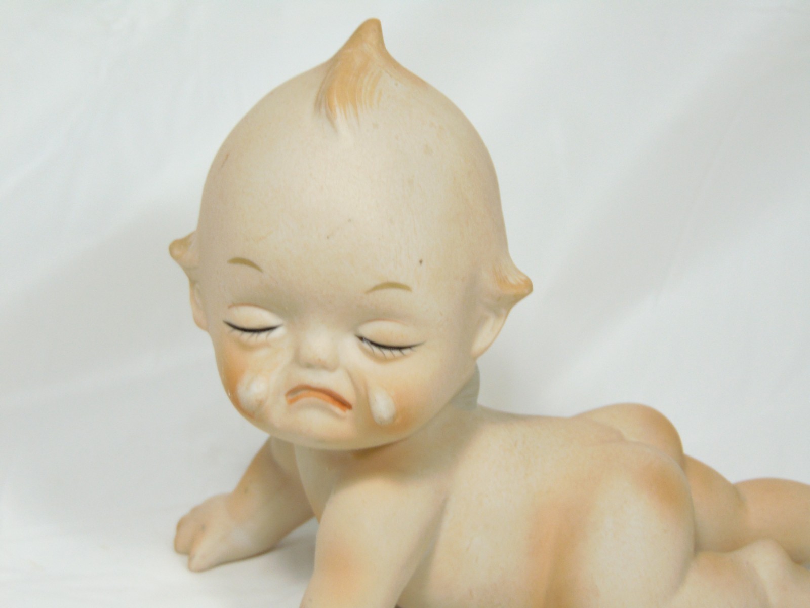 Small Kewpie Crawling Crying Winged Ceramic Figurine
